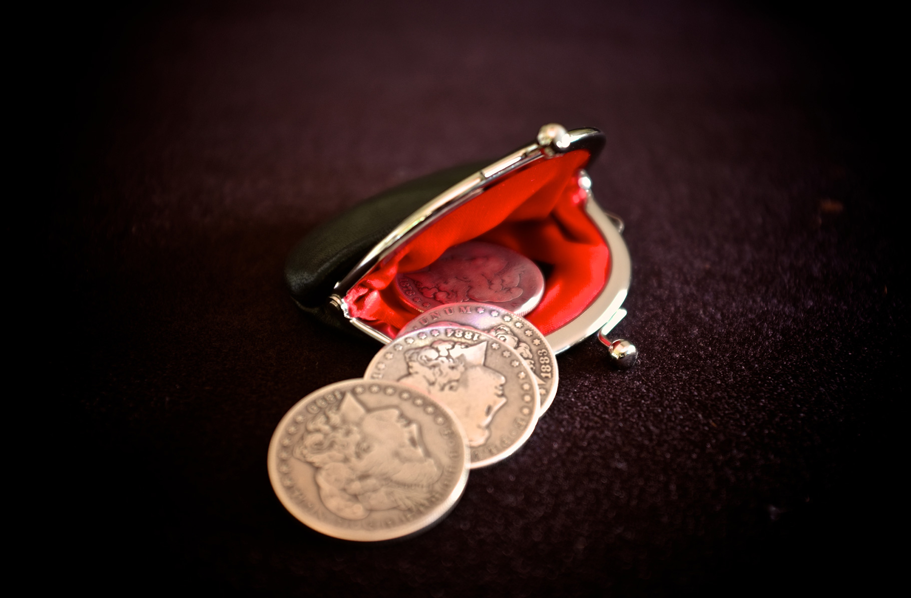 Supple black leather magicians coin purse